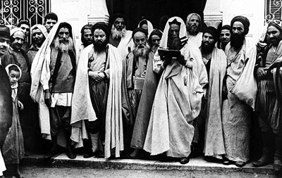 Rabbis at the entrance of El Ghriba synagogue Djerba, Tunisia, 1940's